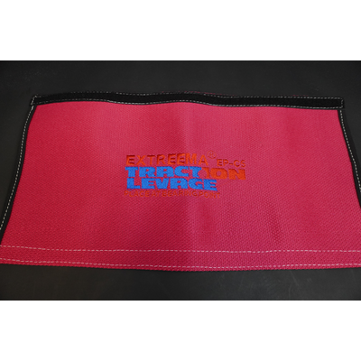 Sling protection embroidered | © Traction Levage Sling protection embroidered with the Traction Levage logo | © Traction Levage